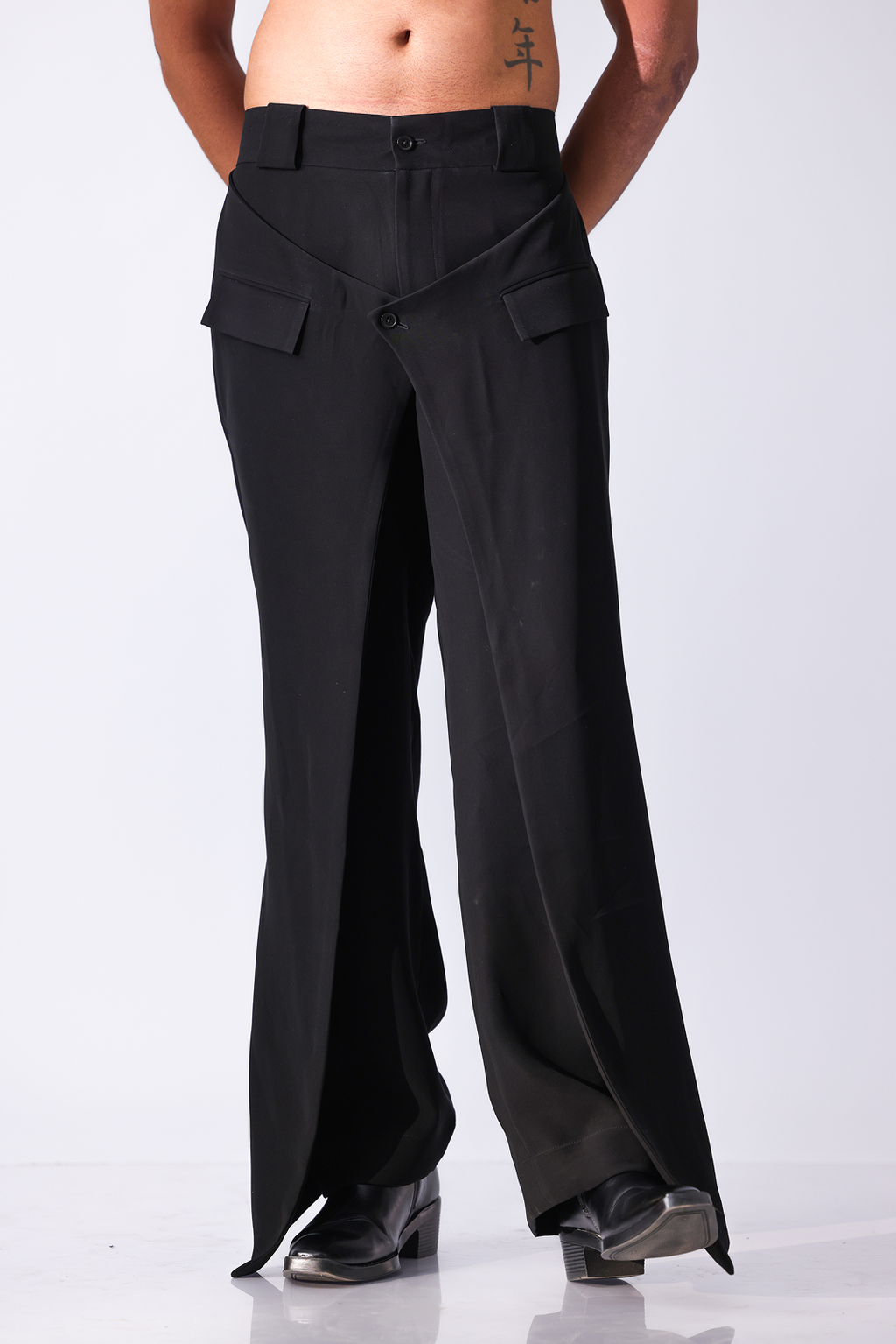 High-waisted black flared trousers
