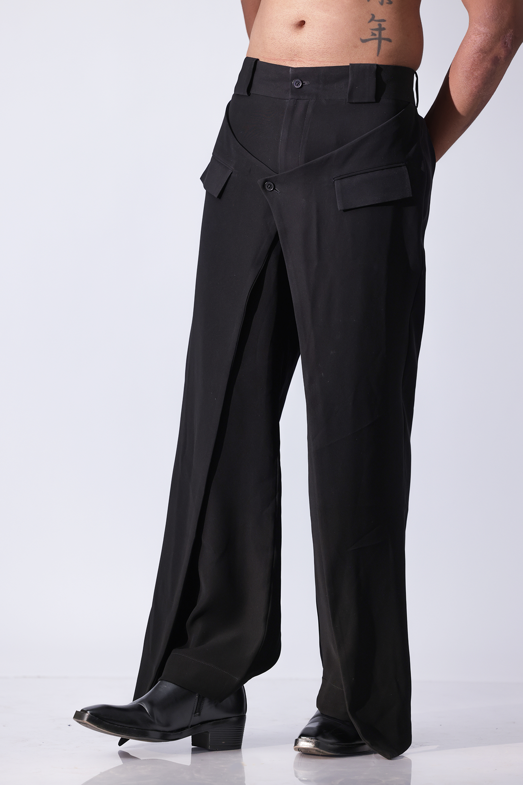 High-waisted black flared trousers