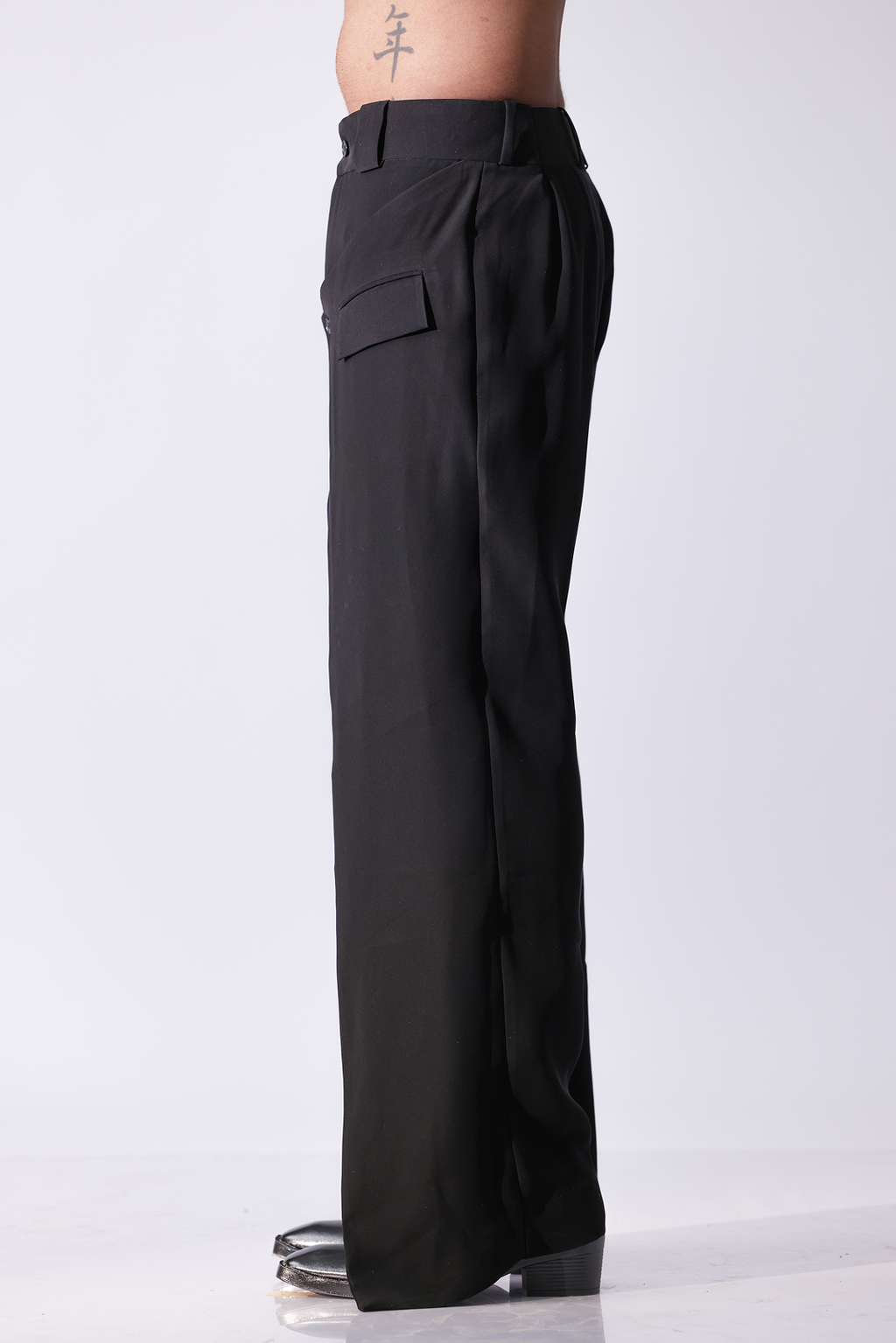 High-waisted black flared trousers