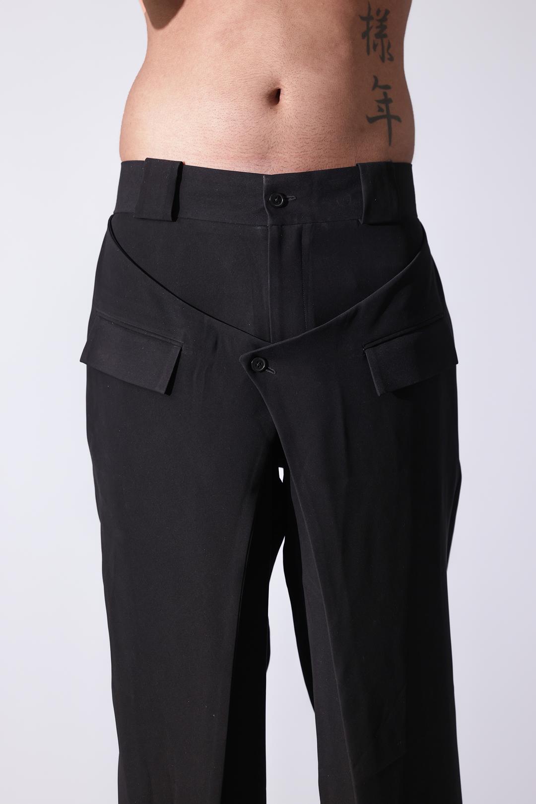 High-waisted black flared trousers