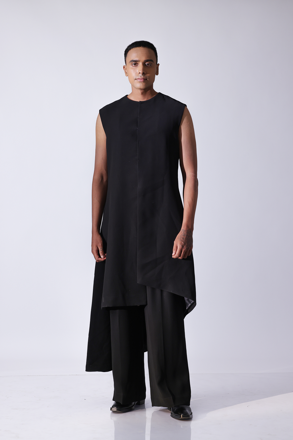LONG BANDI - Round neck long bandi with asymetrical hem