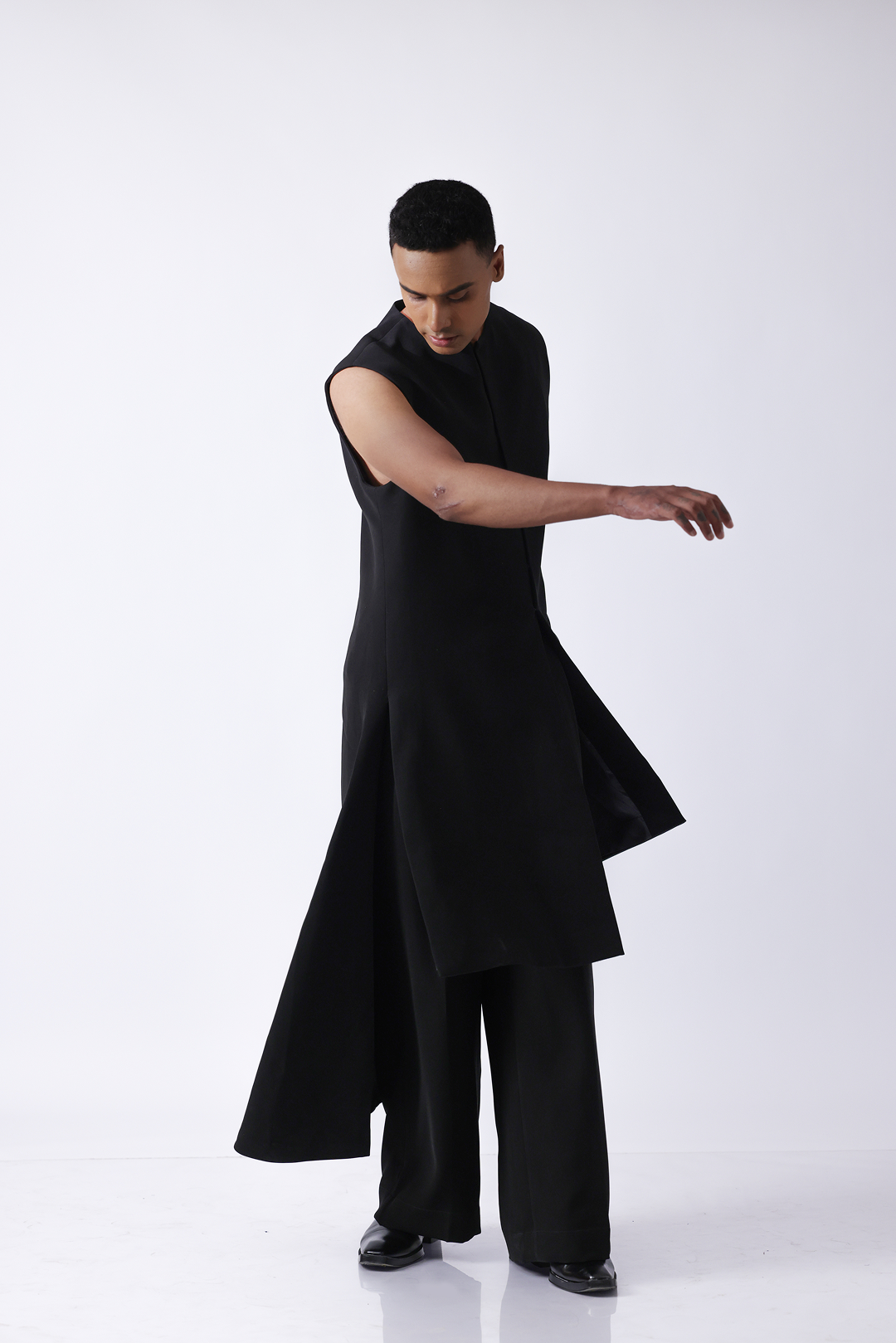 LONG BANDI - Round neck long bandi with asymetrical hem