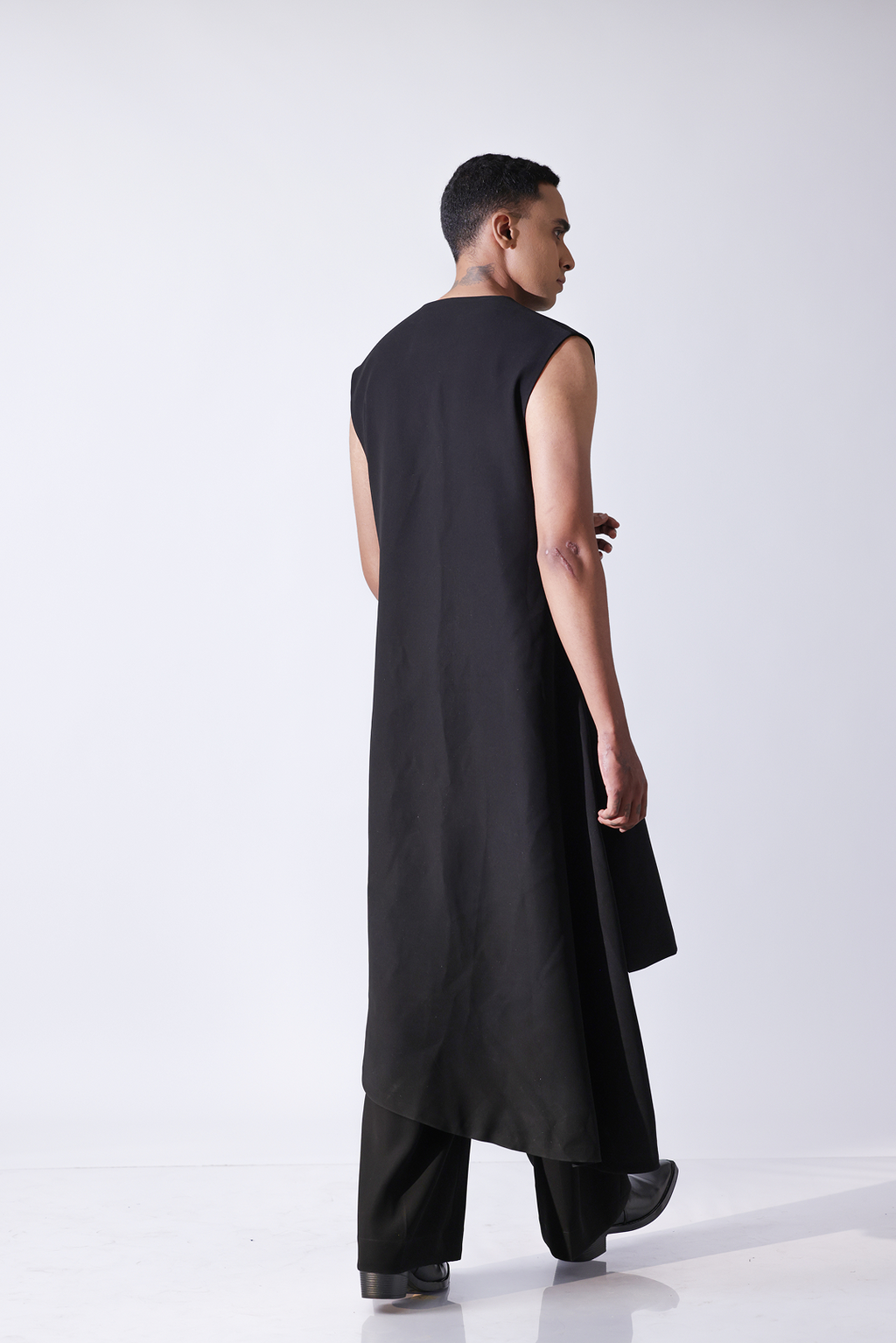 LONG BANDI - Round neck long bandi with asymetrical hem