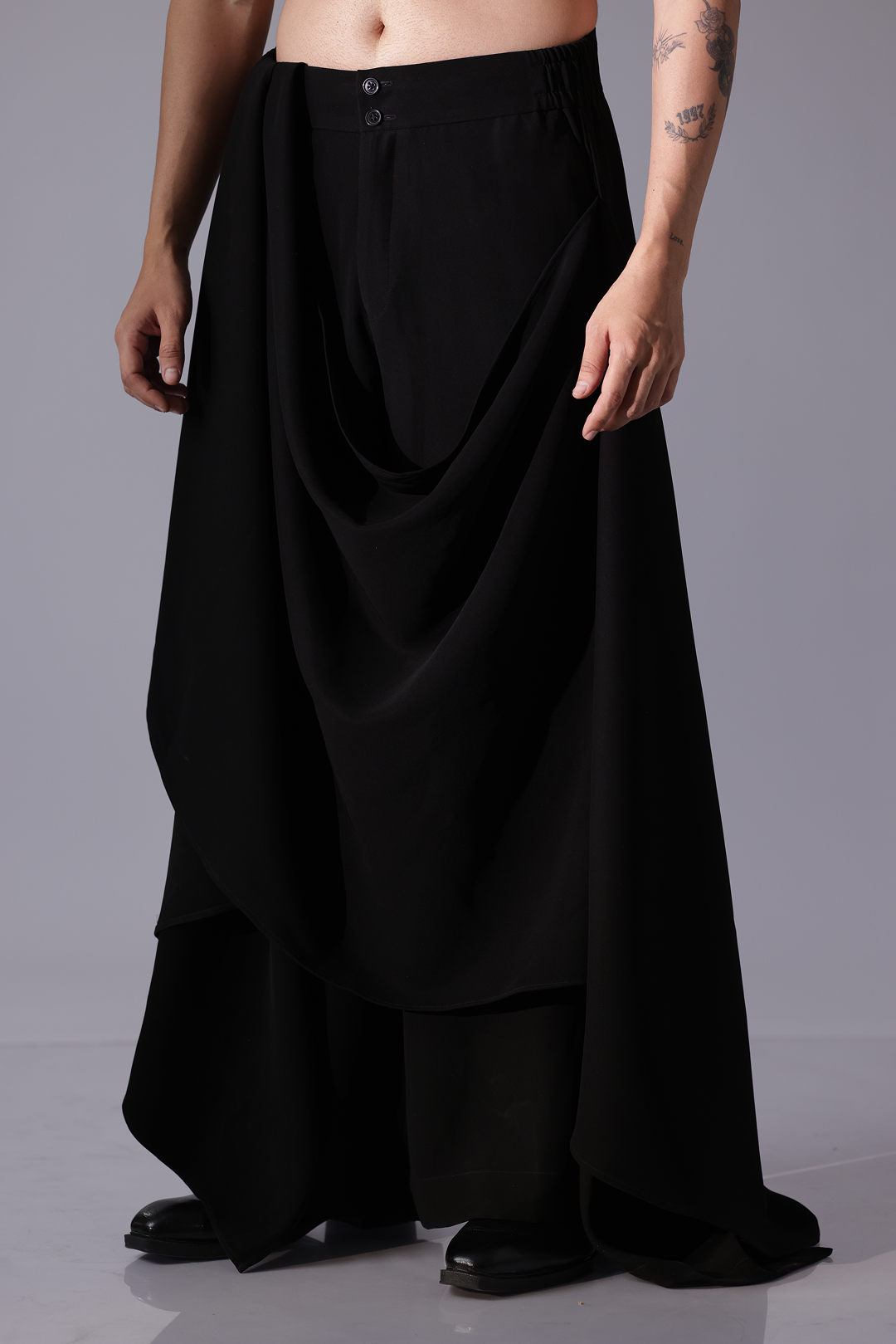 Black pants with drpape allover front
