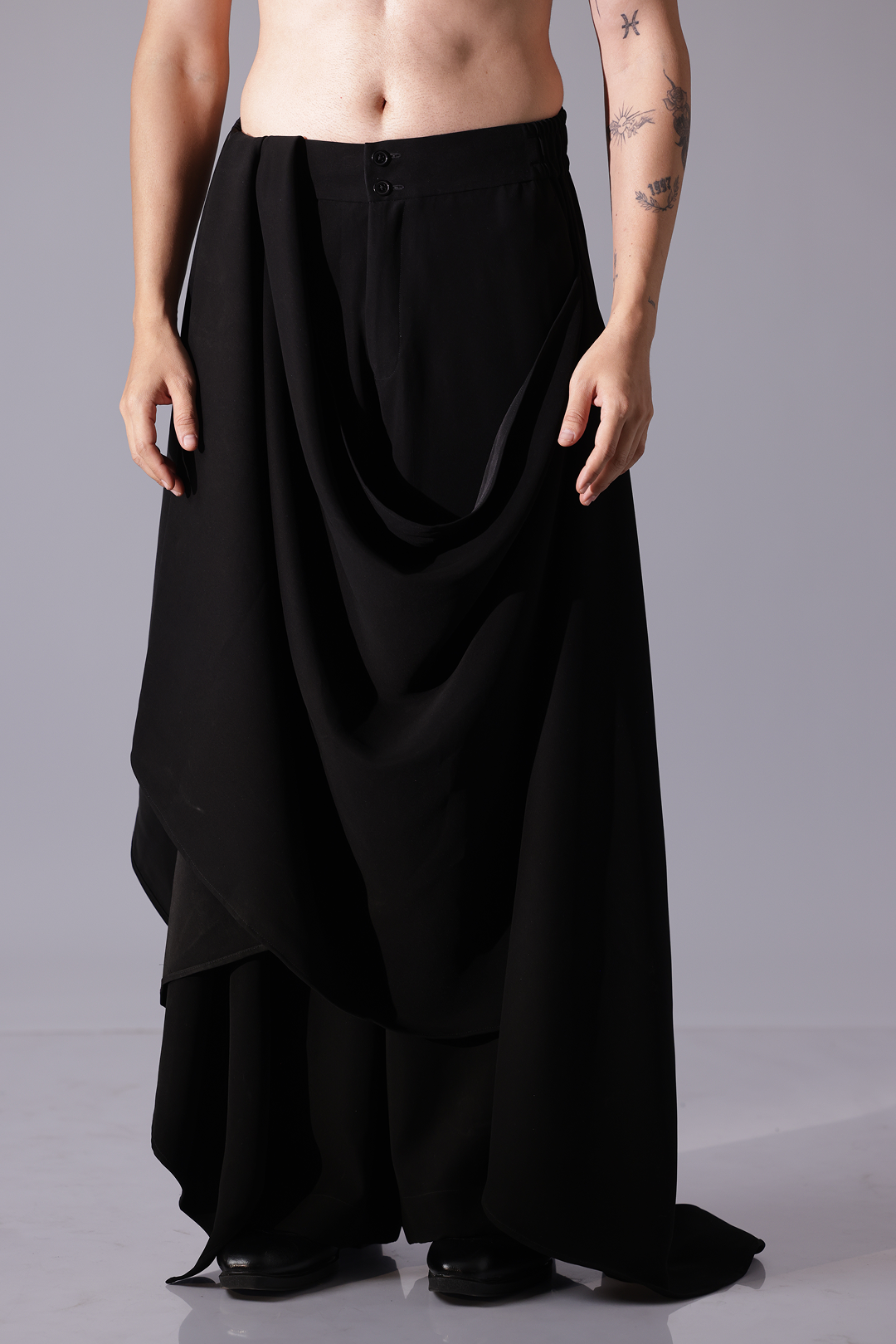 Black pants with drpape allover front