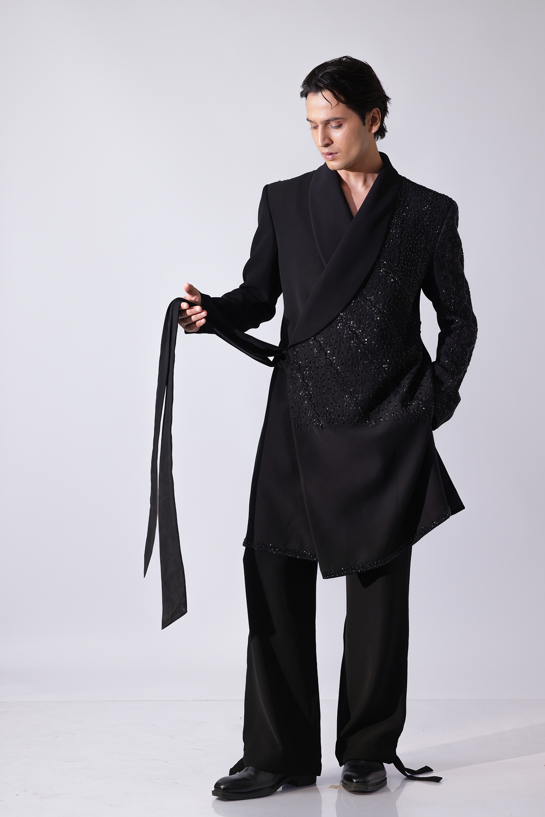 LONG COAT - Black overlap long coat with tonal embroidery and tie-up det