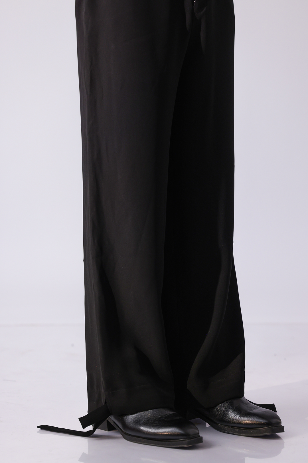 PANT - Black wide leg trousers with side buckle detailing