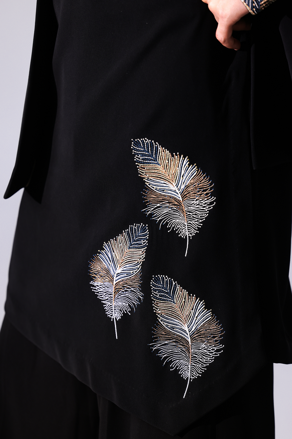 KURTA - Black asymetrical bottom hem kurta with fetaher embroidery