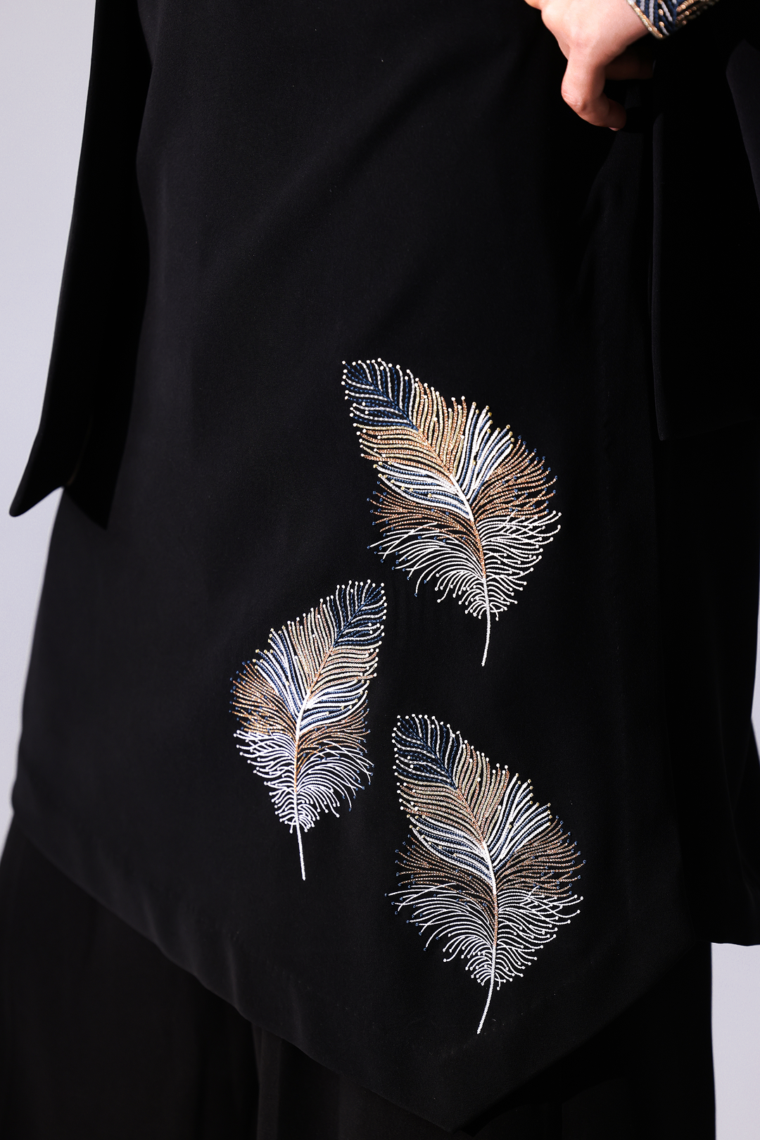 KURTA - Black asymetrical bottom hem kurta with fetaher embroidery